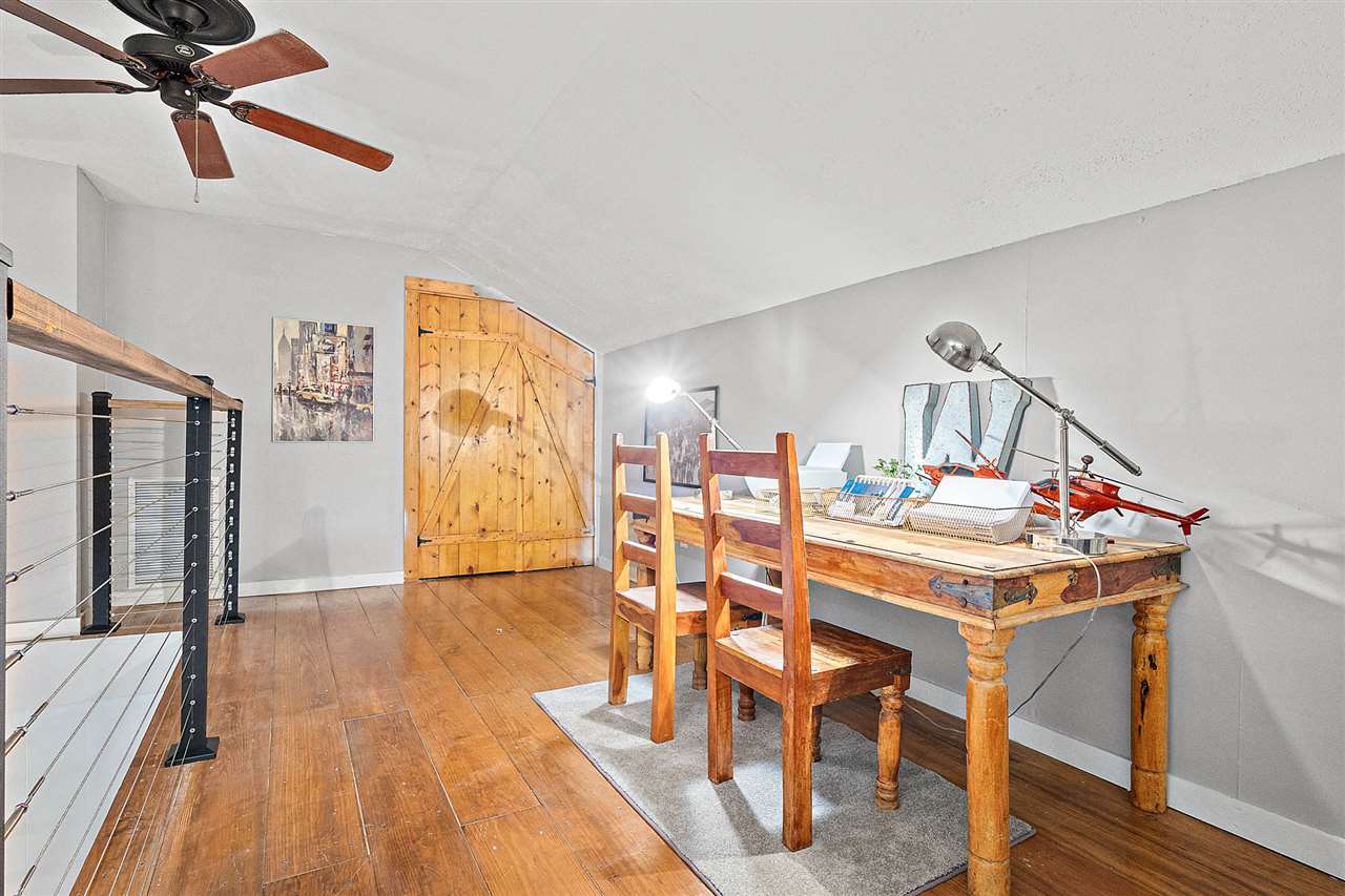 205 Oglethorpe Boulevard St. Augustine, FL 32080 - Photo 42 of 48 a view of a dining room with furniture and wooden floor