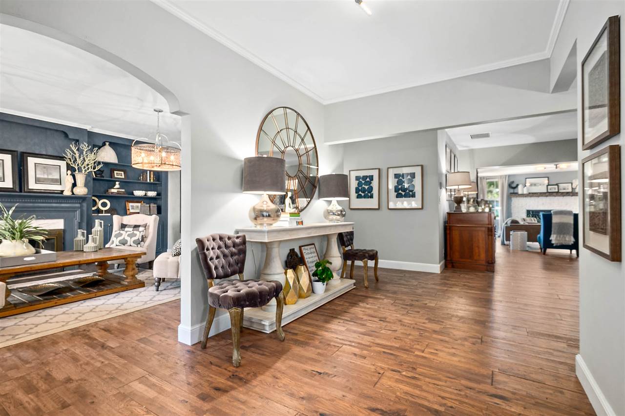 205 Oglethorpe Boulevard St. Augustine, FL 32080 - Photo 10 of 48 a living room with furniture and a wooden floor