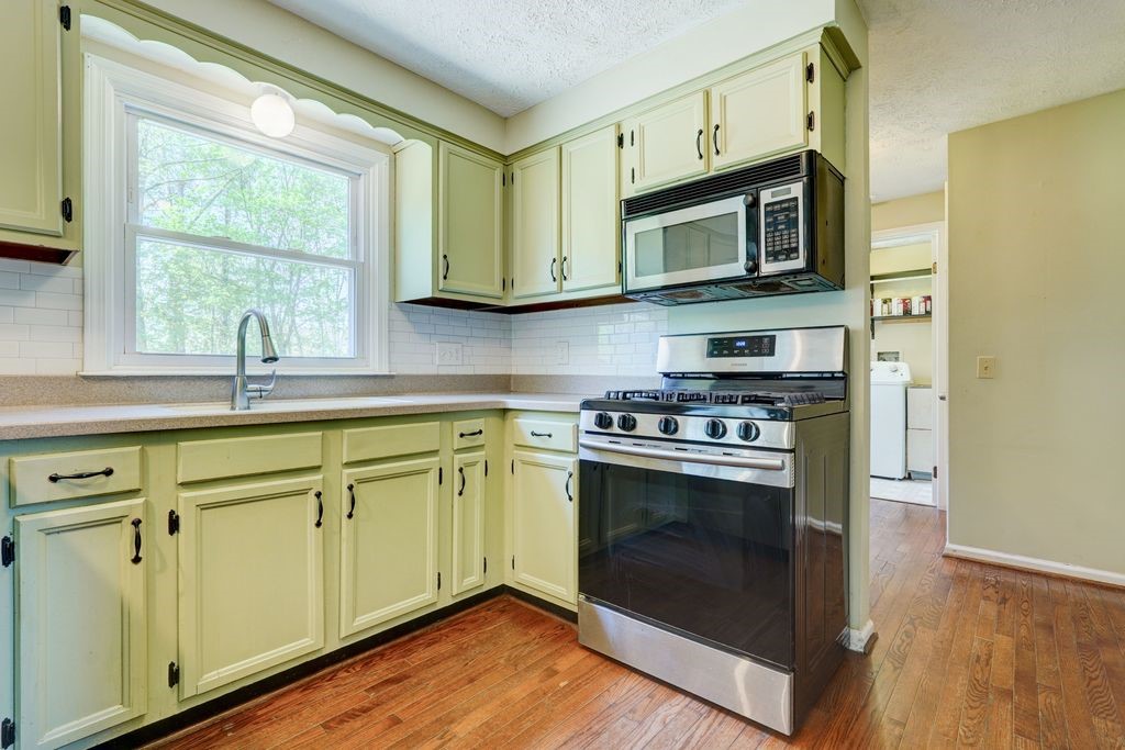 44 Latchmere Drive Victor, NY 14564 - Photo 14 of 50 AMPLE STORAGE CABINETRY WITH SOLID SURFACE COUNTER