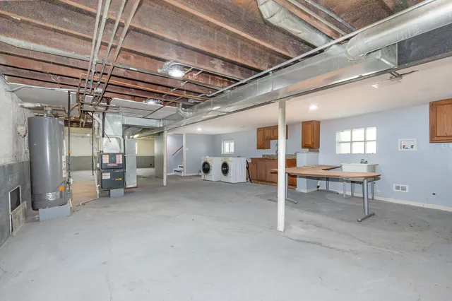 a view of a hallway with seating area