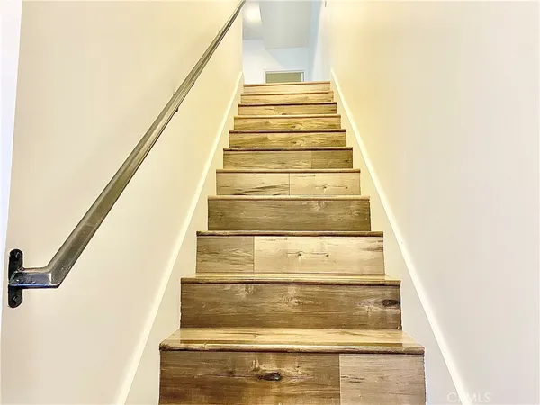 a close view of sink and cabinets