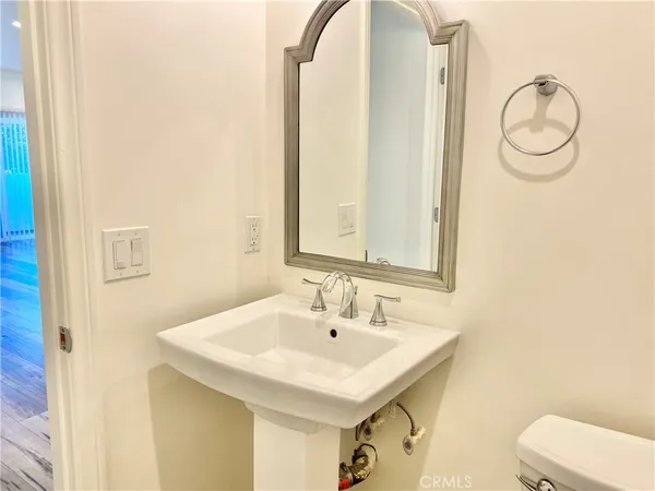 a bathroom with a sink and a toilet