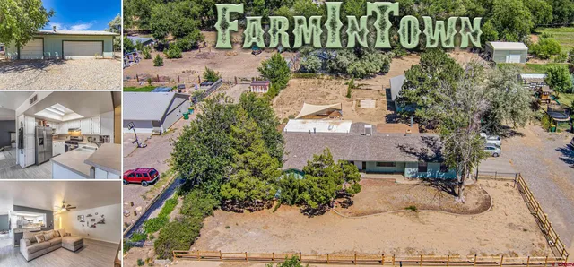 an aerial view of residential houses and car parked on street side