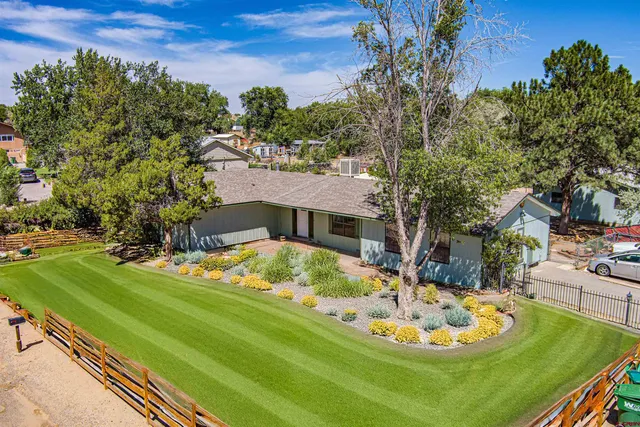 a view of a backyard with a tub