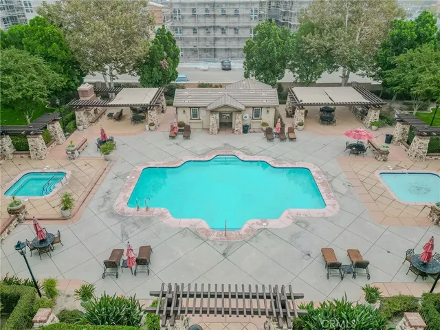 an aerial view of a house with a garden