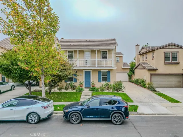 a car parked in front of a house