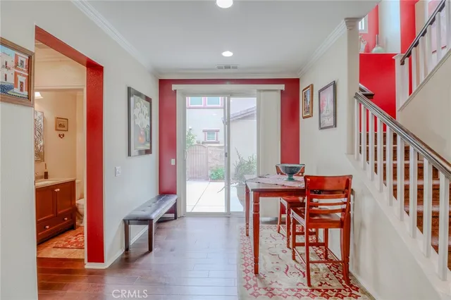a bathroom with a sink vanity and a toilet
