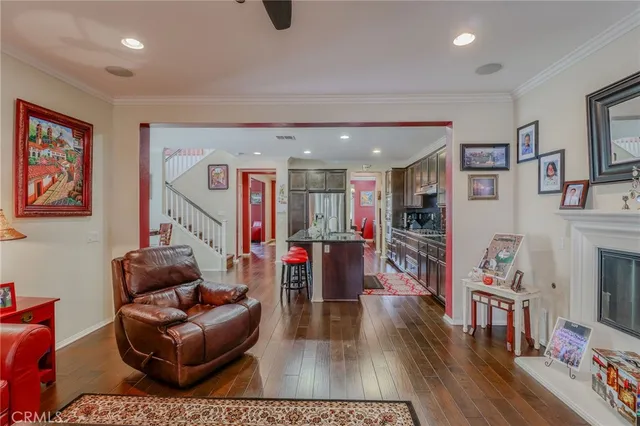 a backyard of a house with lots of green space and fountain