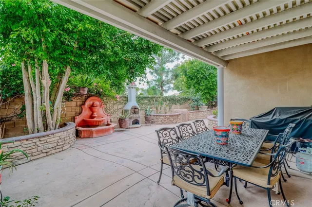 a view of an entryway with furniture and wooden floor
