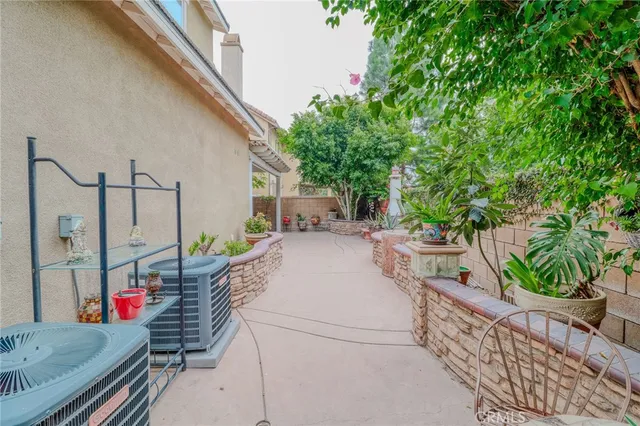 a bathroom with a sink a mirror and a shower