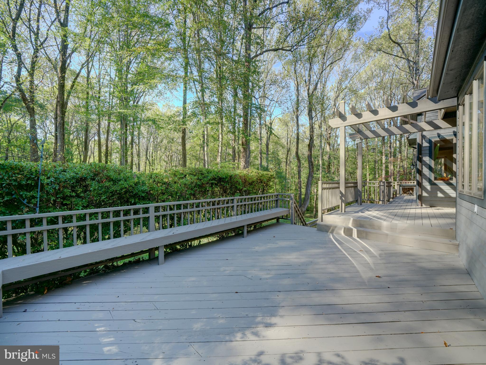 11818 Linden Chapel Road Clarksville, MD 21029 - Photo 111 of 121 a view of a yard with large trees and a wooden fence