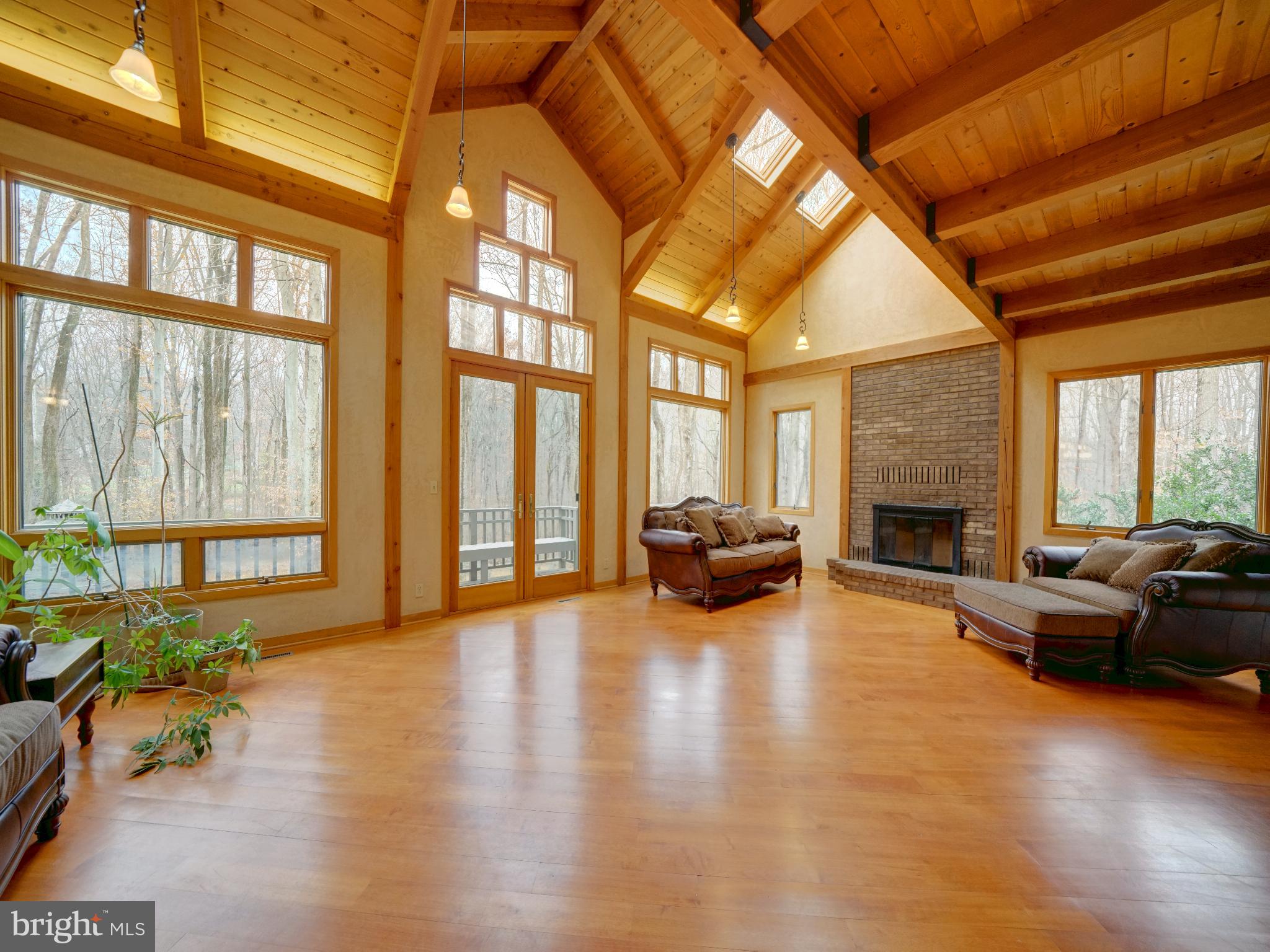 11818 Linden Chapel Road Clarksville, MD 21029 - Photo 2 of 121 a living room with furniture and a fireplace