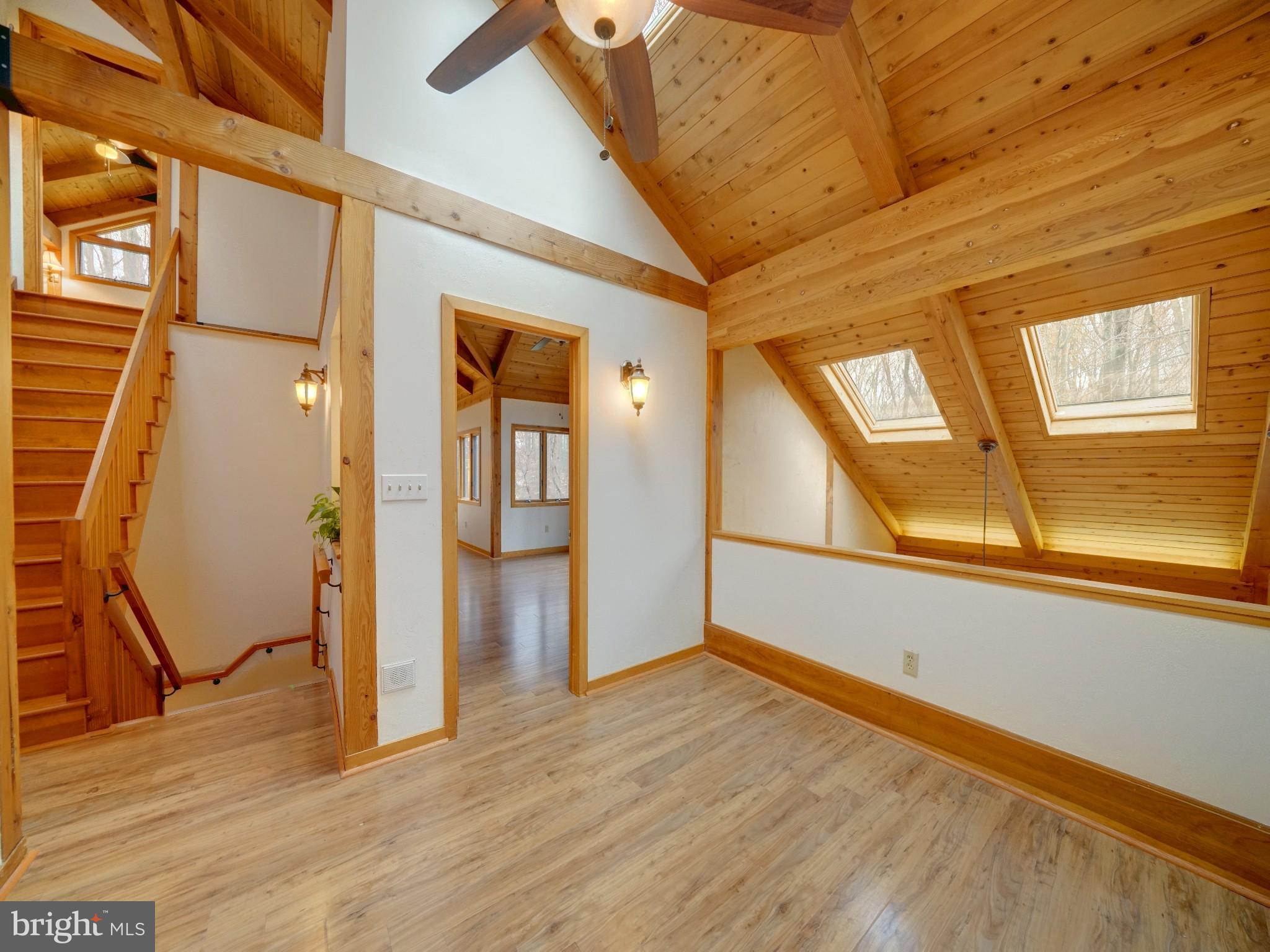 11818 Linden Chapel Road Clarksville, MD 21029 - Photo 38 of 121 a view of empty room with wooden floor and fan