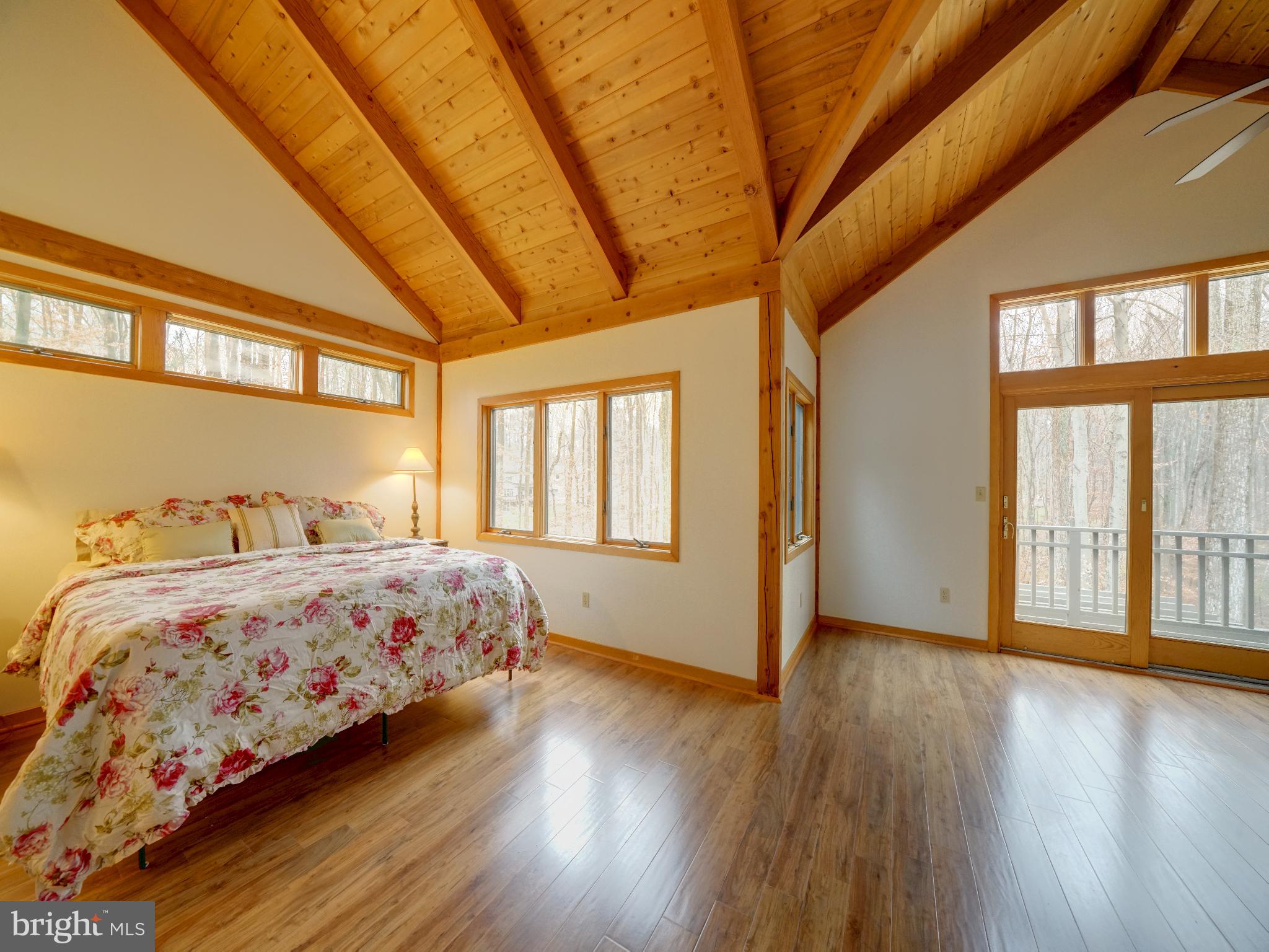 11818 Linden Chapel Road Clarksville, MD 21029 - Photo 43 of 121 a bedroom with bed and wooden floor