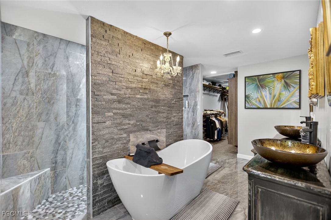 1549 Braeburn Road Fort Myers, FL 33919 - Photo 24 of 38 a living room with furniture and a fireplace