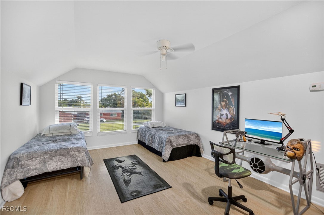 1549 Braeburn Road Fort Myers, FL 33919 - Photo 27 of 38 a bedroom with furniture and a window