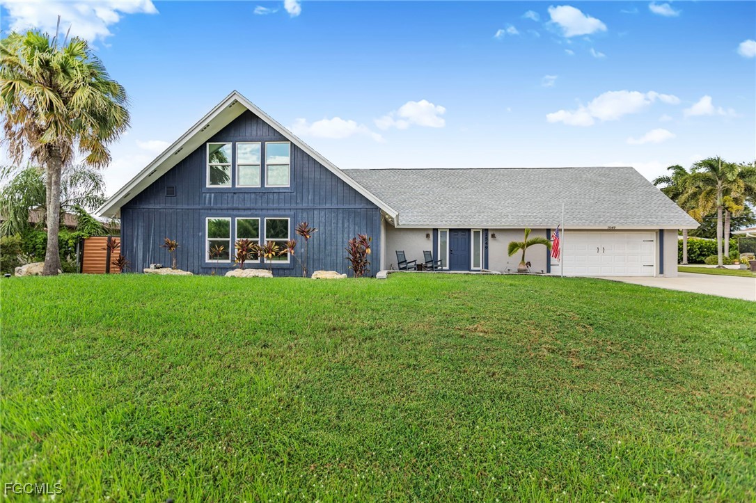 1549 Braeburn Road Fort Myers, FL 33919 - Photo 38 of 38 a front view of house with yard and green space
