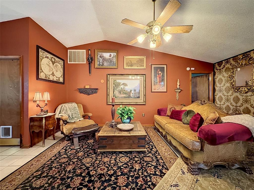 7111 Ricker Avenue Webster, FL 33597 - Photo 10 of 41 a living room with furniture and wooden floor