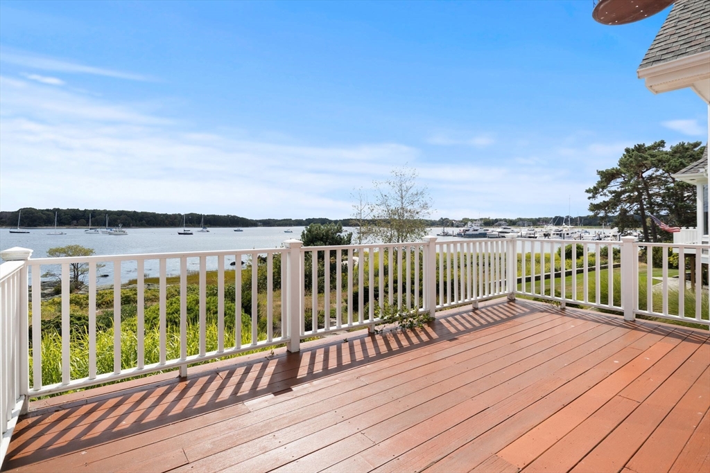 163 Little Harbor Road, Unit 163 New Castle, NH 03854 - Photo 13 of 36 a view of wooden balcony with city view