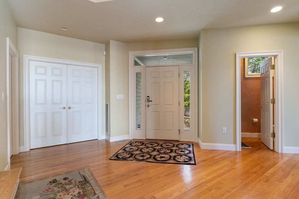 163 Little Harbor Road, Unit 163 New Castle, NH 03854 - Photo 16 of 36 a view of room with window and wooden floor
