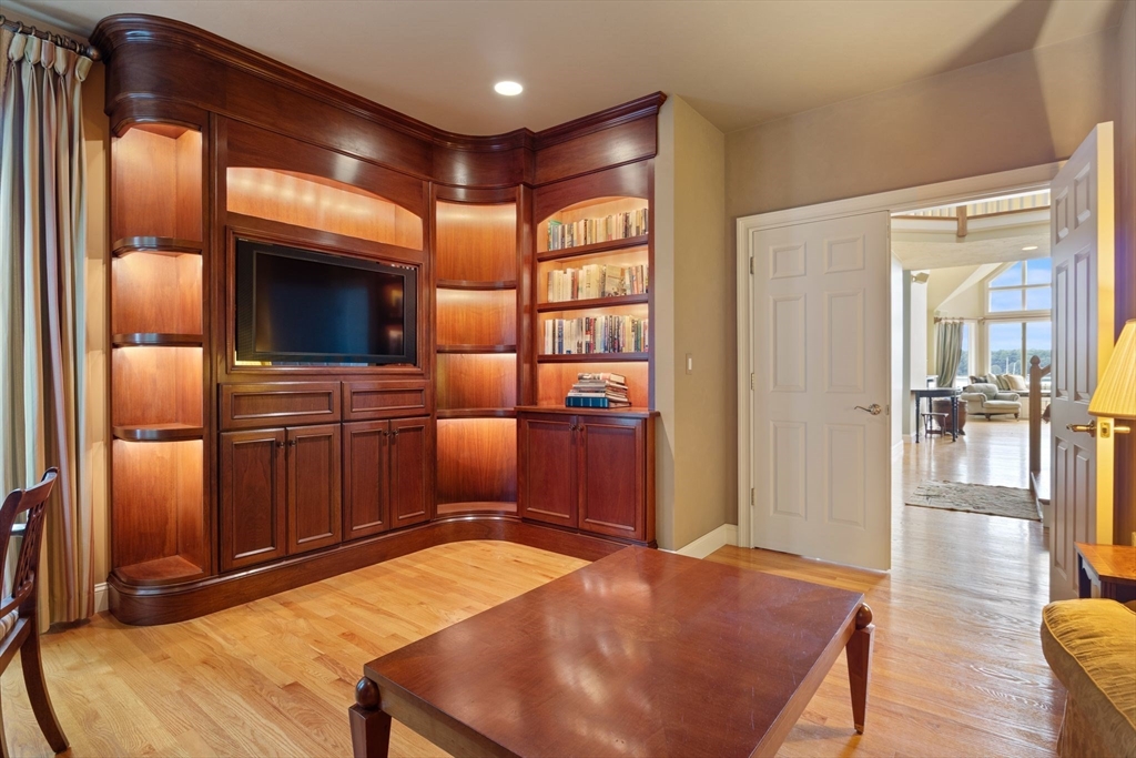 163 Little Harbor Road, Unit 163 New Castle, NH 03854 - Photo 24 of 36 a living room with stainless steel appliances furniture and kitchen view