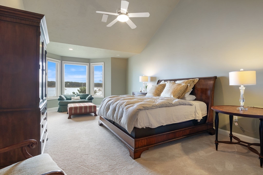 163 Little Harbor Road, Unit 163 New Castle, NH 03854 - Photo 26 of 36 a spacious bedroom with a bed and window