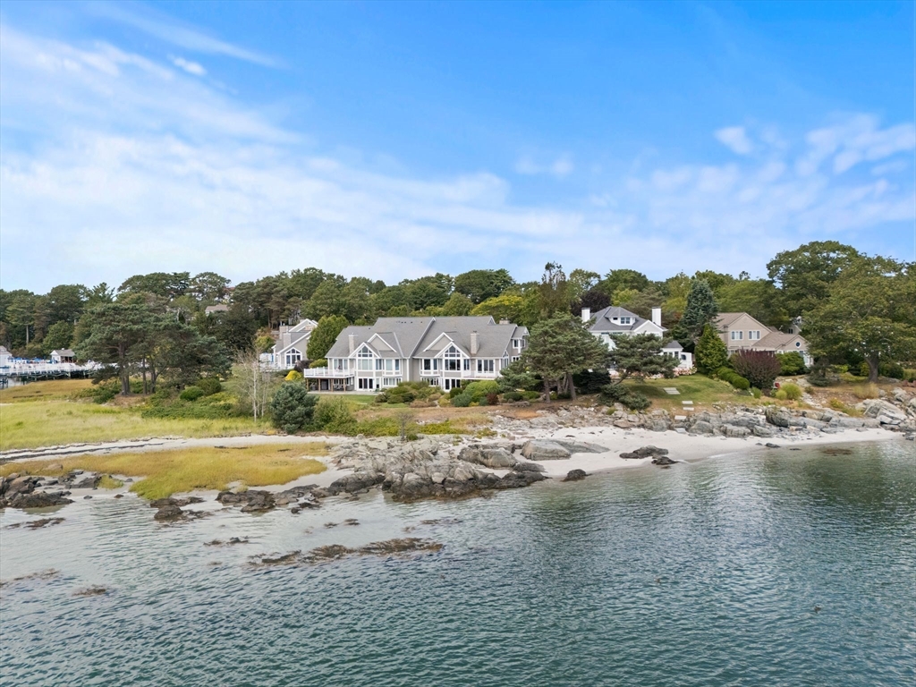 163 Little Harbor Road, Unit 163 New Castle, NH 03854 - Photo 33 of 36 a view of a lake with houses