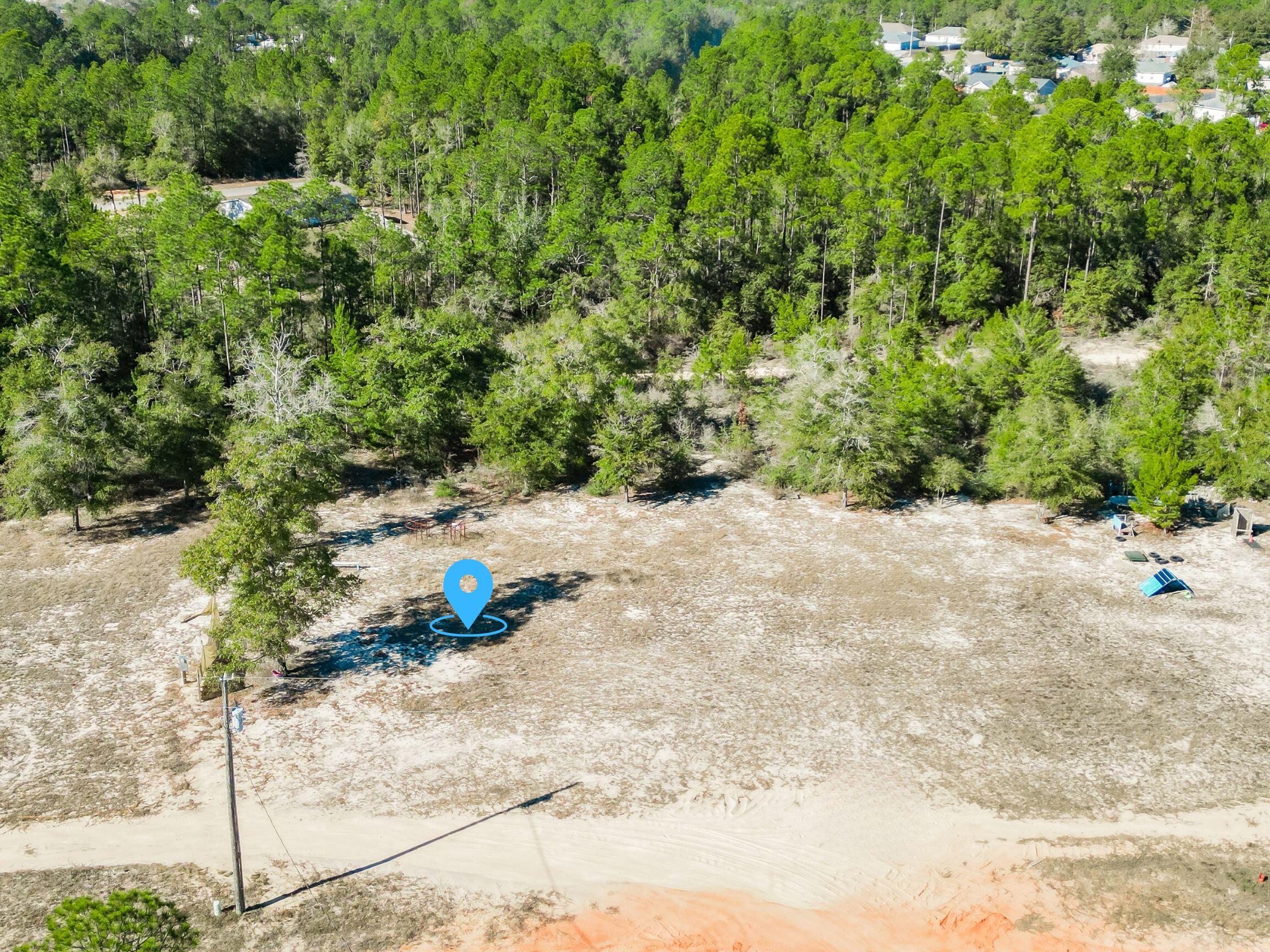 4716 Canary Way Crestview, FL 32539 - Photo 7 of 13 a view of an outdoor space and a yard
