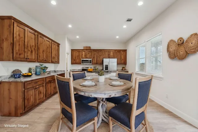 a view of a dining room with furniture