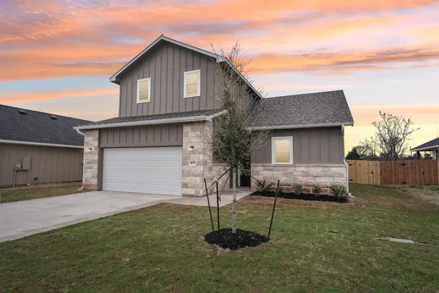 a house view with a garden space