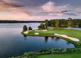 a view of a lake with a big yard