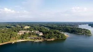an aerial view of a houses with ocean view