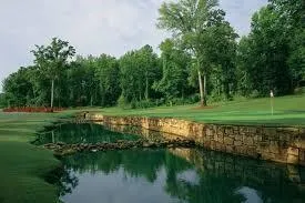 a view of a golf course with a lake