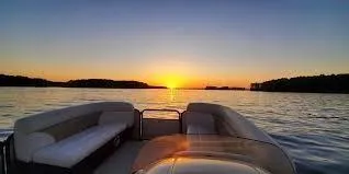 a roof deck with a ocean view