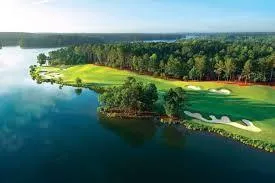 a view of a lake with a yard