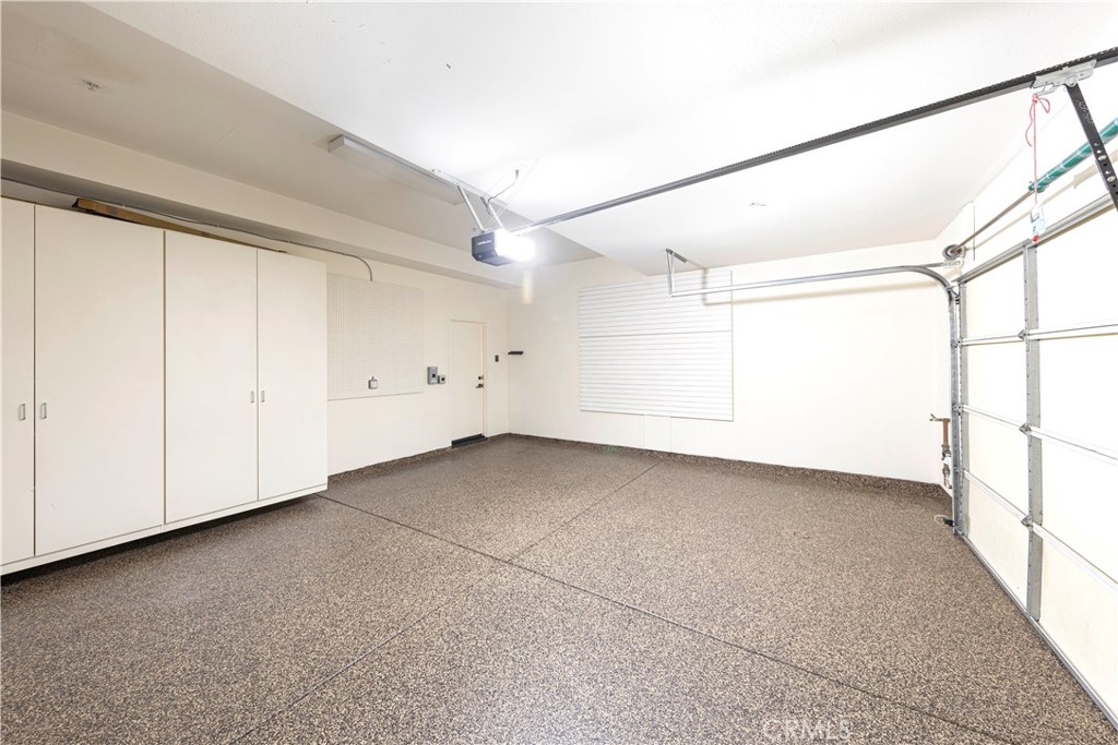 51 Mandria Newport Coast, CA 92657 - Photo 25 of 32 2-car garage with storage