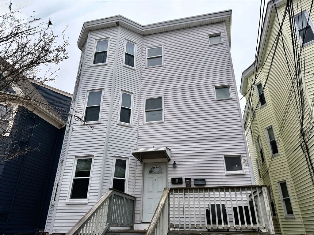 5 Partridge Avenue Somerville, MA 02145 - Photo 1 of 11 a view of a house with a large windows
