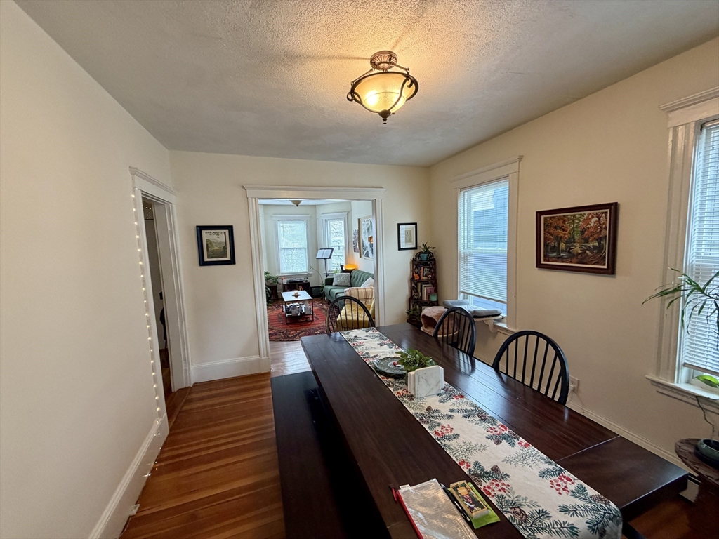 5 Partridge Avenue Somerville, MA 02145 - Photo 4 of 11 a view of a livingroom with furniture window and wooden floor