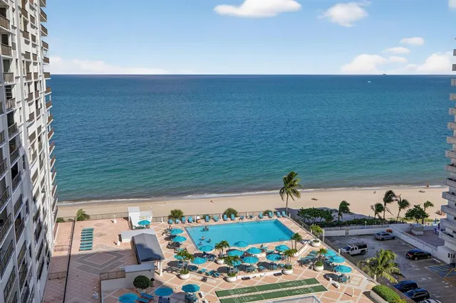 a view of a livingroom with furniture and front door