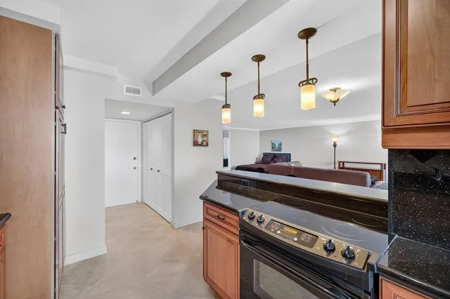 a bathroom with a toilet a sink and a mirror
