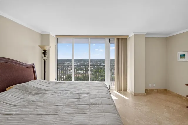 a en suite bathroom with double vanity sinks a mirror and a bathtub