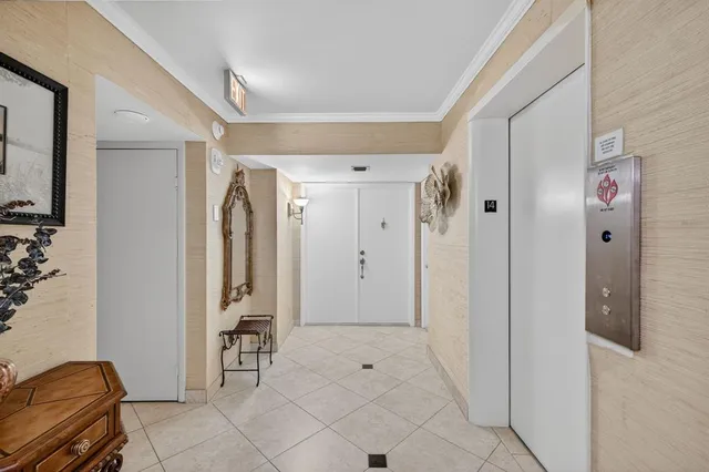 a living room with furniture gym equipment and a table