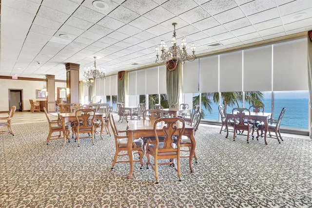 a front view of a building with garden