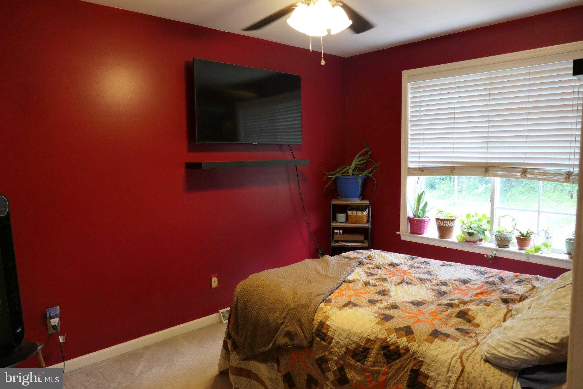 178 Riders Way Lebanon, PA 17042 - Photo 15 of 24 Cozy retreat with vibrant red walls.