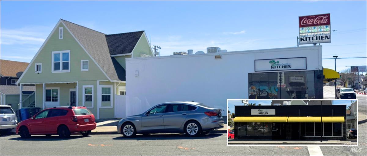 a view of a car parked in front of a building