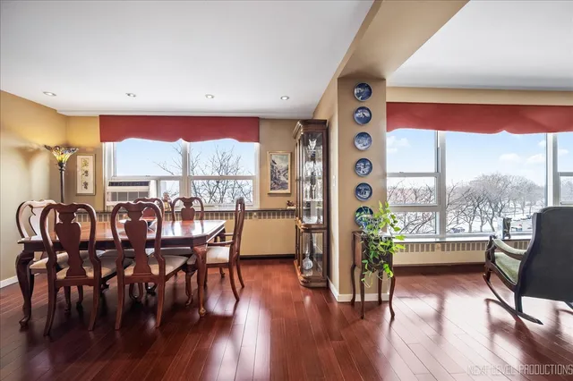 a kitchen with stainless steel appliances granite countertop wooden cabinets a stove top oven a sink and dishwasher