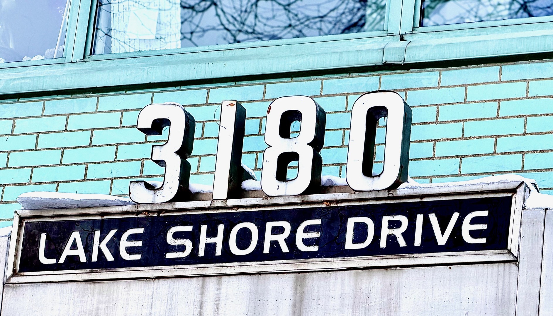 3180 North Lake Shore Drive, Unit 5E Chicago, IL 60657 - Photo 28 of 28 a close up of a street sign