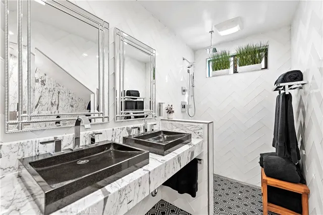 a kitchen with sink stove and refrigerator