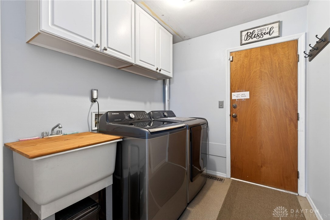 5907 Red Coach Road Dayton, OH 45429 - Photo 24 of 50 This functional space offers convenience and ample storage for all your laundry needs.