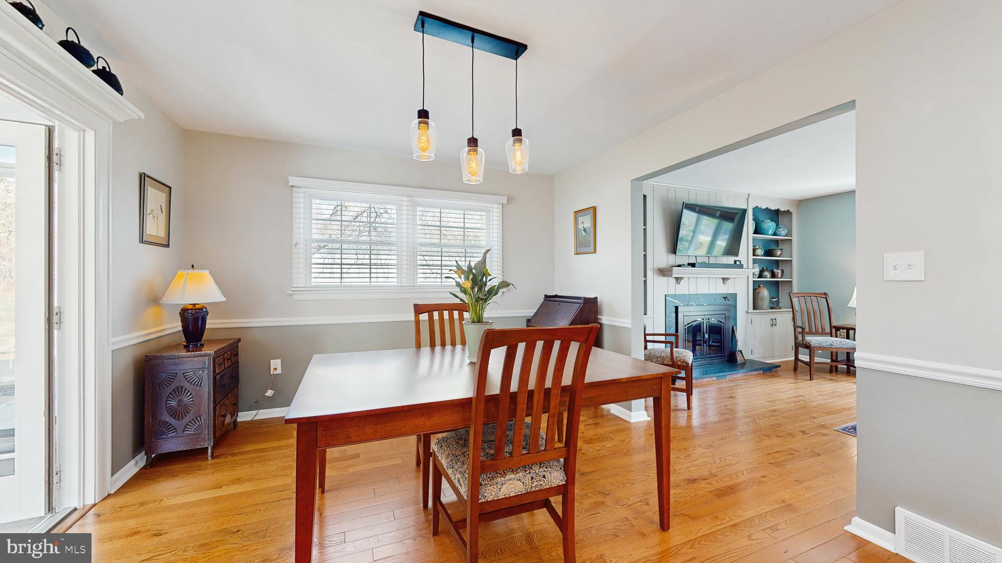 27 Farm Road Ewing, NJ 08638 - Photo 14 of 47 a view of a dining room with furniture window and wooden floor